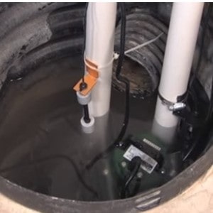 Here is an example of basin wide enough for backup sump pump  and primary pump to be installed side by side on bain floor.